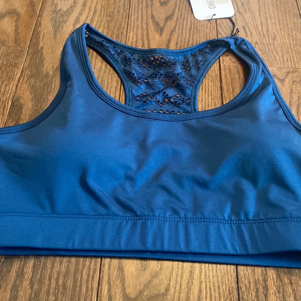 Brand new with tags.  Zyia Navy Bomber Bra.  size large